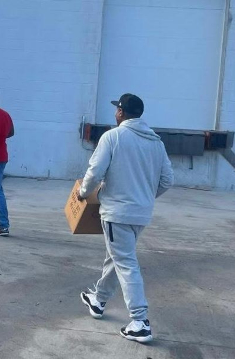 Carrying donated supplies to give back to the community