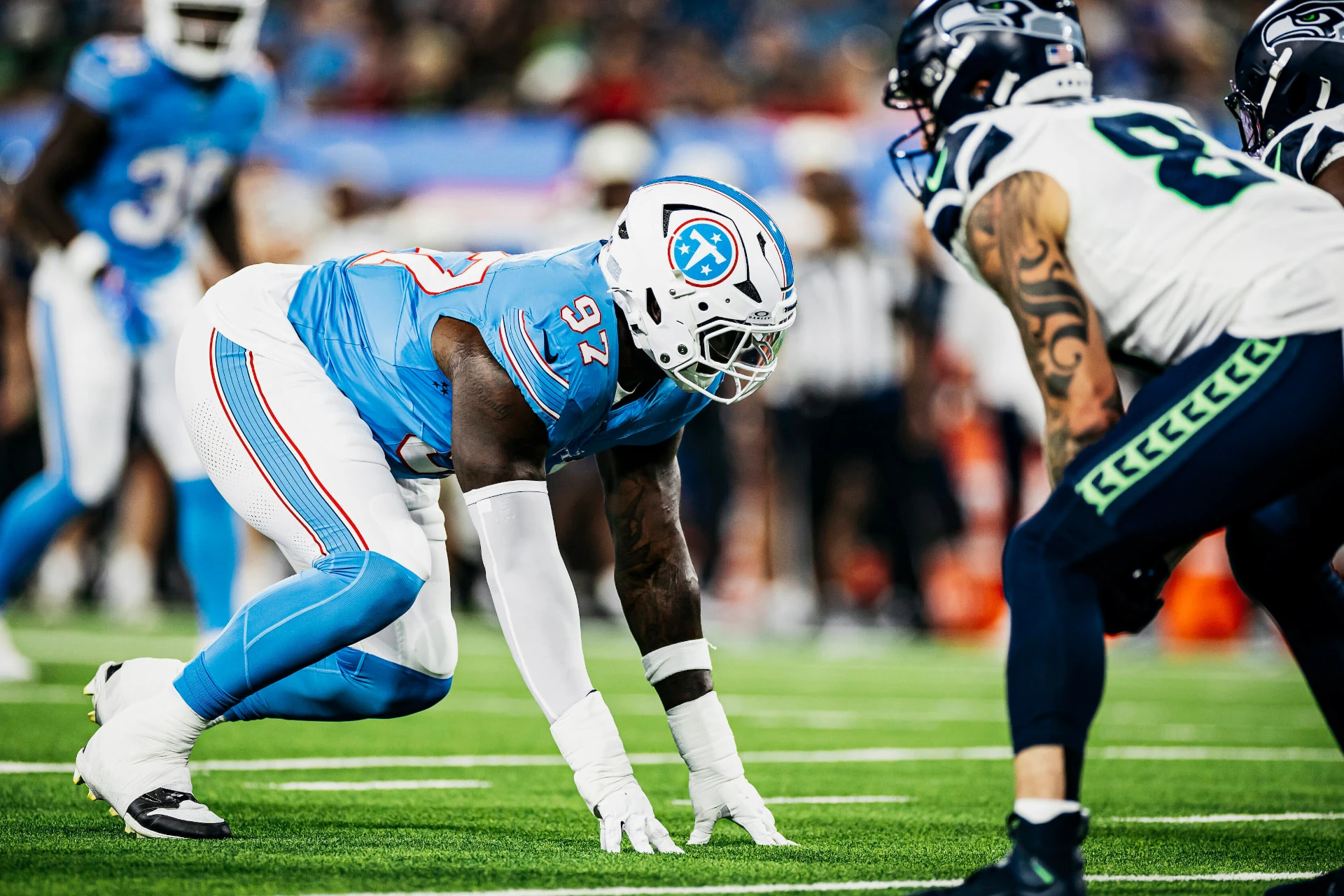 Jalyn Holmes playing defensive line for the Tennessee Titans